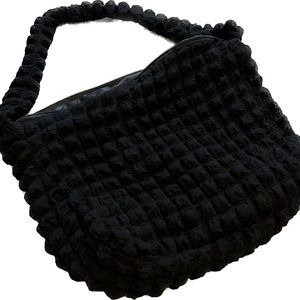 Brand new sling bag - black and textured